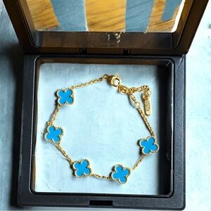 Gold Bracelet with Blue Four Clover Charms